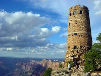 DESIGNED IN 1932 BY MARY COLTER, THE DESERT VIEW WATCHTOWER OVERLOOKS THE EASTERN END OF GRAND CANYON N. P. THE COLORADO RIVER IS VISIBLE LOWER LEFT. MIKE QUINN, NPS. 