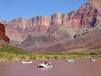 A COMMERCIAL RAFT TRIP ON THE COLORADO RIVER PASSES CARDENAS CREEK IN GRAND CANYON NATIONAL PARK. MIKE QUINN, NPS. 