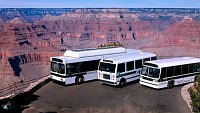 THREE BUSES FROM GRAND CANYON NATIONAL PARK'S CURRENT SHUTTLE BUS FLEET. (CNG BUS ON THE LEFT, LNG BUS IN THE MIDDLE, ELECTRIC BUS ON THE RIGHT) NPS PHOTO