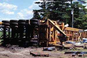 Mobile tower crane tip-over attempting to hoist water tank.