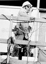 Figure 1. Worker with fall protection systems in place