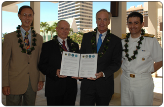 Secretary of the Interior Dirk Kempthorne and senior-level federal health officials have signed an agreement at the Insular Areas Health Summit to establish a task force to help island leaders prioritize their critical health care system needs.  From left, Under Secretary of Defense for Personnel and Readiness David S.C. Chu; Secretary of Veterans Affairs James B. Peake, M.D.; Secretary Kempthorne; and  Health and Human Services Assistant Secretary for Health Joxel Garcia, M.D. [Photo by Tami Heilemann, DOI-NBC]