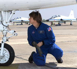 JSC2002-E-09906 : Astronaut Eileen Collins near trainer jet