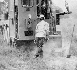 Figure 1. Rock driller working without respiratory protection on a mobile rig