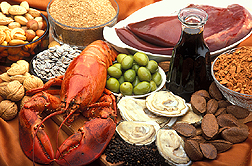 Photo: Display of foods rich in copper: nuts, sunflower seeds, lobster, green olives, wheat bran, liver, blackstrap molasses, cocoa, oysters, black pepper. Link to photo information