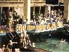 photo of swimmers on steps and balconies