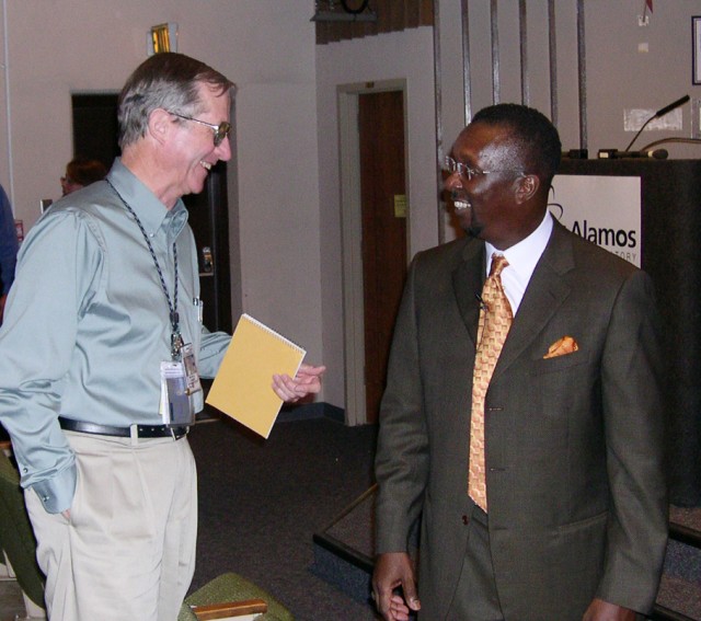 Norman Hamer of Fluid Dynamics (T-3) talks with Swinton after Tuesday's talk.