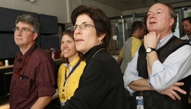 Delight shows on the faces of Scott H. Robinson, far left; Kimberly Katko, left; Diana Esch-Mosher, right; and Steve Knox, far right, as they watch from the Lab's Satellite Operations Center at the Physics Building at Technical Area 3 as the Cibola Flight Experiment launches.