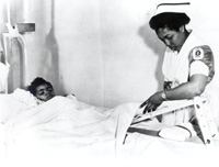 African American nurse with patient