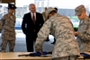 Defense Secretary Robert M. Gates watches as Air Force Basic Military Trainees disassemble and reassemble M16 rifles during a visit to Kelly and Lackland Air Force Bases in San Antonio, Texas, July 24, 2008.  