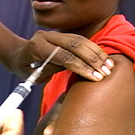 An AIDS vaccine being administered