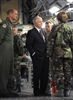 U.S. Defense Secretary Robert M. Gates receives a briefing from airmen while on a tour of a C-17 Globemaster III aircraft at McChord Air Force Base, Wash., July 7, 2008.  