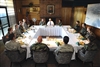 U.S. Defense Secretary Robert M. Gates answers questions from Team McChord airmen during lunch at McChord Air Force Base, Wash., July 7, 2008.  
