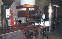 The Flickerwood bottling area, with six-bottle filler and semiautomatic corking machine