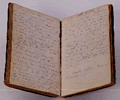 one of Whitman's leather-bound notebooks