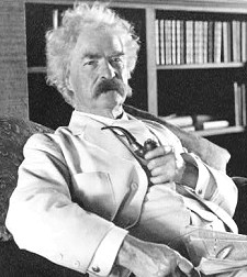 Photo of Samuel Langhorne Clemens (Mark Twain), three-quarter length portrait, seated, facing slightly right, holding pipe. Created [between 1900 and 1910], c1941. Prints and Photographs Division, Library of Congress.