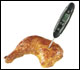 Instant-read thermometer in chicken leg/thigh quarter