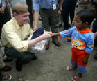 During his travel to Southeast Asia, Deputy Secretary Zoellick visited Banda Aceh and met with a young tsunami survivor. AP/Wide World photo