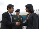 Secretary Rice  is greeted by MOFAT Director General Cho Tae-yong and Lt. General David Valcourt upon arrival at K-16 Air Base in Seoul.  