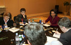 Secretary Rice speaks with the travelling press during a media roundtable in Beijing, China, October 20, 2006.