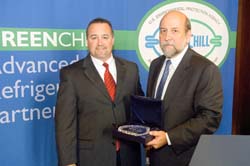 Steve Sloan accepts a GreenChill founding partner award on behalf of Publix Super Markets 