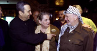 Prime Minister Barak, Secretary Albright, and Chairman Arafat greet each other at dinner