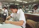 photo:  woman in textile factory