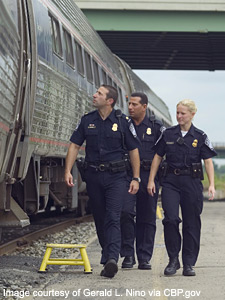 Border Agents Inspecting Train - copyright © 2006 Gerald L. Nino via CBP.gov - used with permission