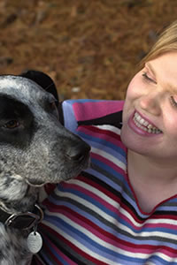 a veterinarian tending to a dog