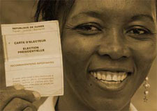 woman with a voter card