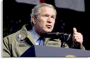 President George W. Bush speaks to troops during his visit to Fort Hood in Killeen, Texas, Friday, Jan. 3, 2003.  White House photo by Eric Draper.