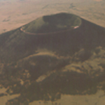 aerial color photo of capulin volcano showing crater and road