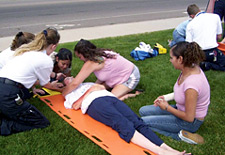 Image of students practicing first aide