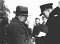 A Polish policeman checks the papers of a Jewish ...