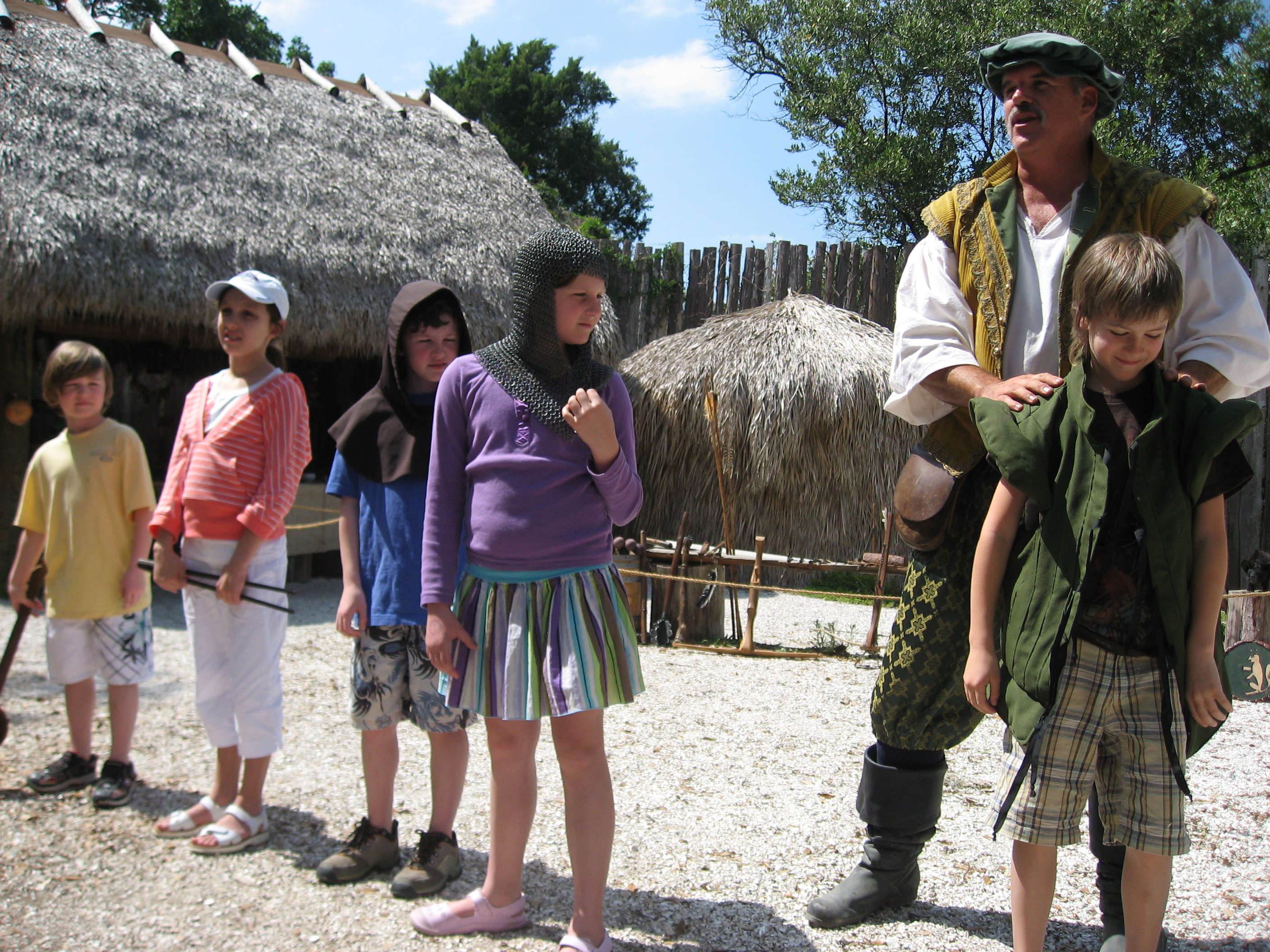 Living history ranger Scott Schrader talks to local school school children.