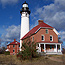 The Au Sable Light Station was constructed in 1874 to protect ships on Lake Superior.