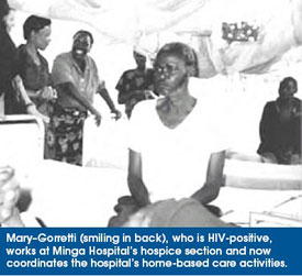 Mary–Gorretti (smiling in back), who is HIV-positive, works at Minga Hospital’s hospice section and now coordinates the hospital’s home-based care activities.