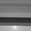 A brilliant spot of sunlight, the opposition effect, travels outward across the rings as the Cassini spacecraft orbits Saturn.  This surge in ring brightness is created around the point directly opposite the Sun from the spacecraft