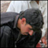 Naeem, a plumber from Lassan hamlet in Kaghan Valley, tightens a joint on a newly laid water pipe in his neighborhood.