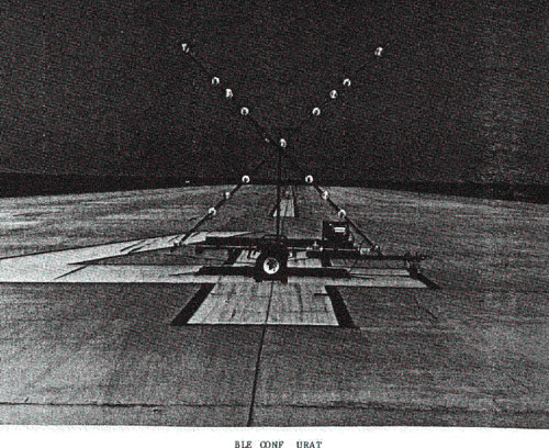 Figure 1. Variable Configuration Device showing an X formed upright and mounted on a trailer to project a signal into approach area. (BLE CONF URAT)