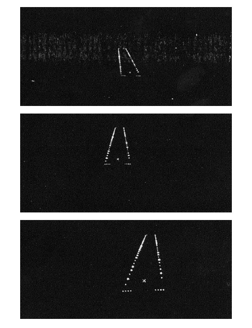 Figure 5 shows three nighttime aerial views of the lighting array, which pilots perceived as an X at least 1-1/2 miles from the threshold in time to execute a safe missed approach.