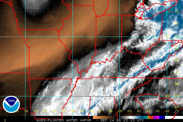 A recent water vapor image from GOES-12, zoomed in over a tropical disturbance.  Click on the image for a larger view.