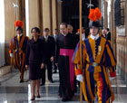 Secretary Rice is escorted by the Swiss Guard as she enters the Vatican.