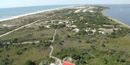 View from the top of Fire Island Lighthouse, looking west over the narrow island to the inlet in the distance.
