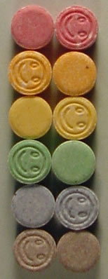 photo - MDMA tablets of various colors