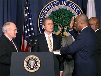 Secretary Paige's swearing-in ceremony as Secretary of Education, attended by Vice President Cheney, President Bush, Secretary Paige, his son, and his brother.