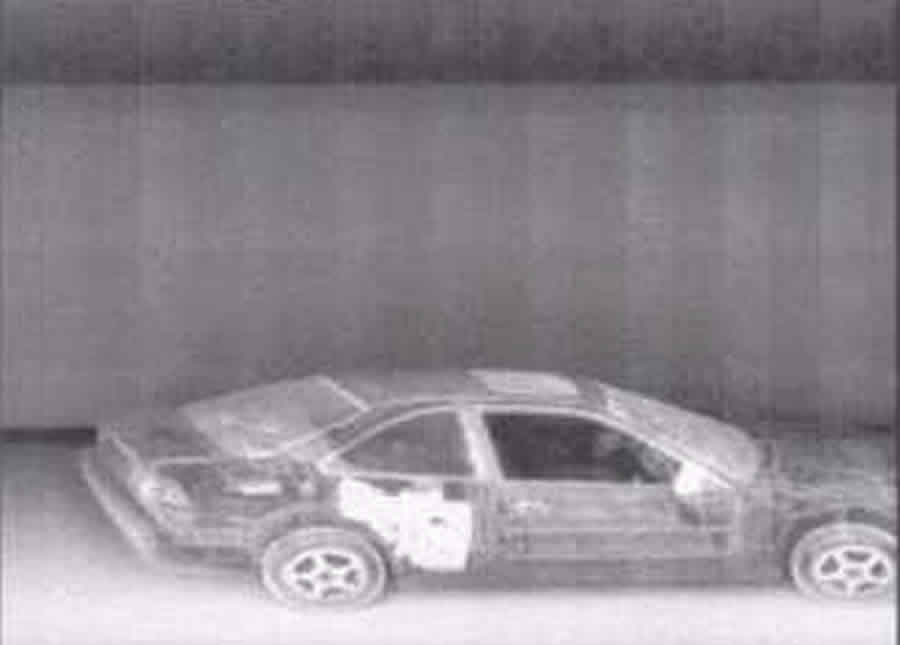 Image - A x-ray photo of a car.