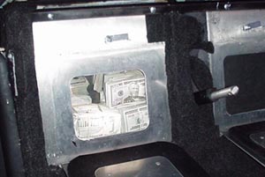 Concealed compartment where money was hidden inside a Lincoln Navigator stretch limo containing $580,250.