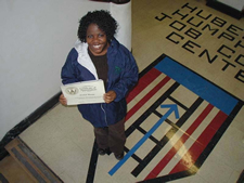 Image of a young woman with a certificate