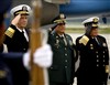 U.S. Navy Adm. Michael G. Mullen, chairman of the Joint Chiefs of Staff, Gen. Freddy Padilla, Colombian chief of defense and Vice Adm. Guillermo Barrera, commander of the Colombian Navy, render salutes during a full honors ceremony welcoming Mullen to Colombia, Jan. 16, 2008. 